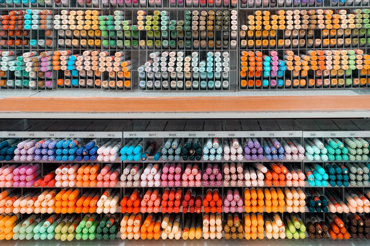 Colorful pens and markers on display